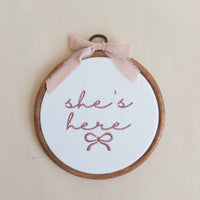 She's Here Embroidered Hoop Sign
