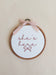 She's Here Embroidered Hoop Sign